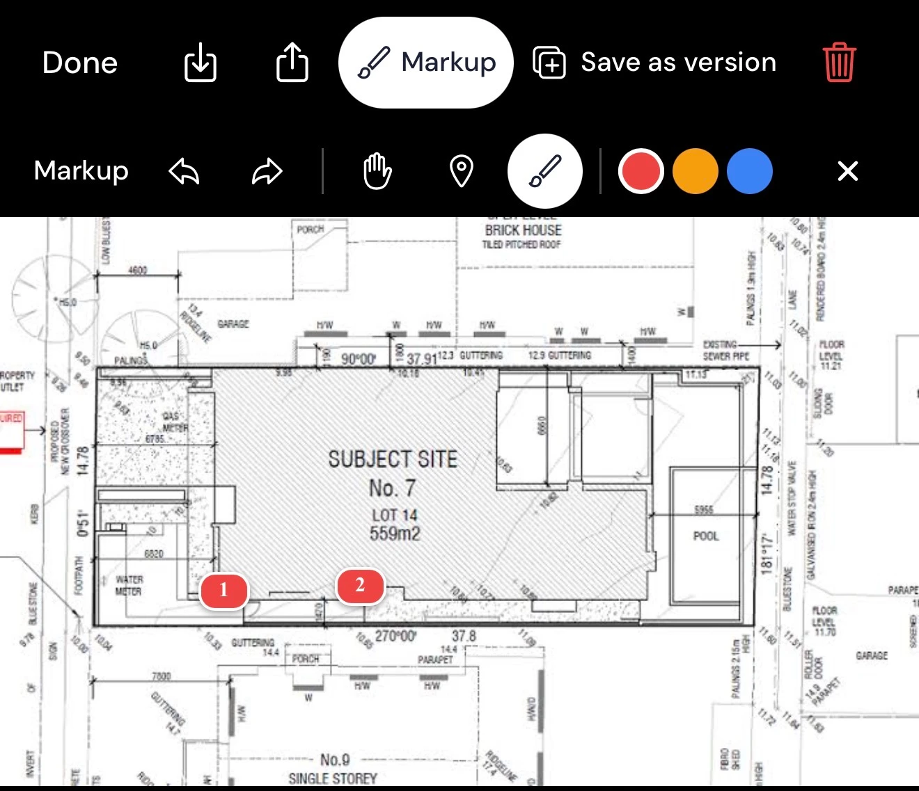Marking up a site plan with pins and annotations in Titus